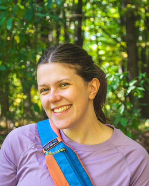 Woman smiling in the woods