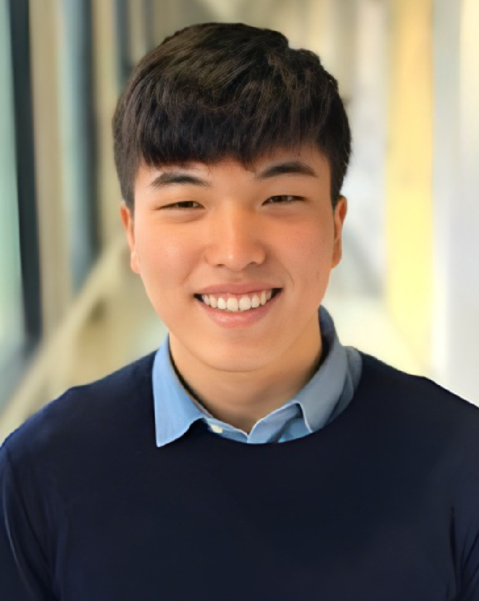 Man with short brown hair smiling